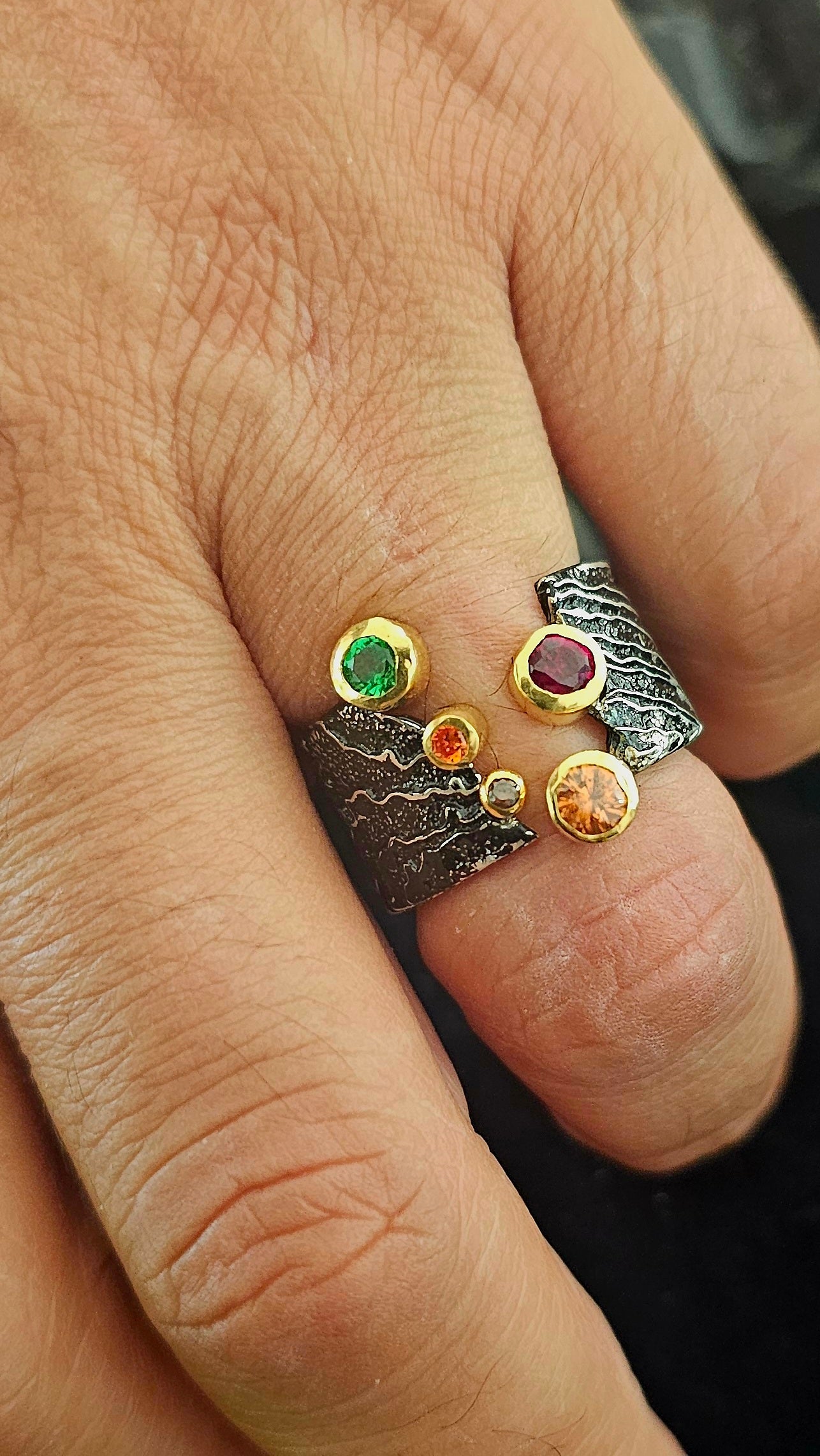 The Rift of Realms” – the split-design ring that feels like a tear between dimensions.